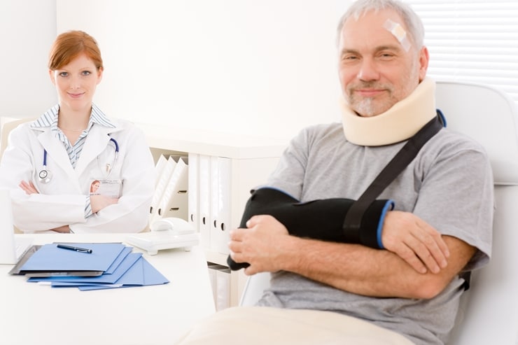 Senior patient broken arm in doctor office