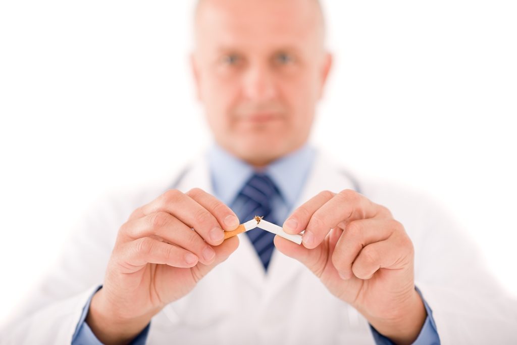 Stop smoking mature male doctor break cigarette